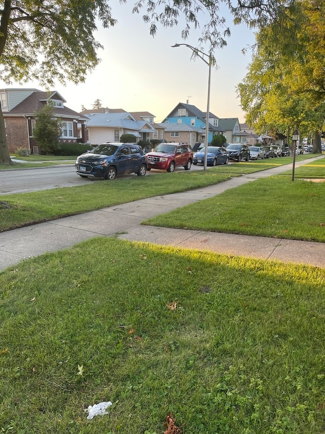 view of yard at dusk