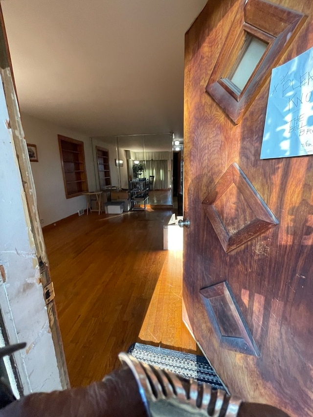 interior space with hardwood / wood-style floors