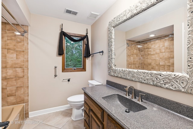 full bathroom featuring tile patterned floors, toilet, tiled shower / bath combo, and vanity