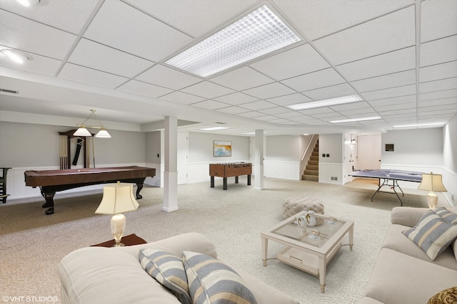 living room with a paneled ceiling, pool table, and carpet floors