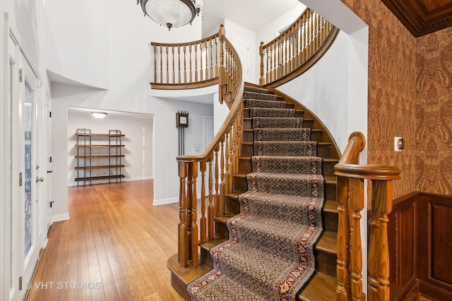 stairs featuring hardwood / wood-style flooring