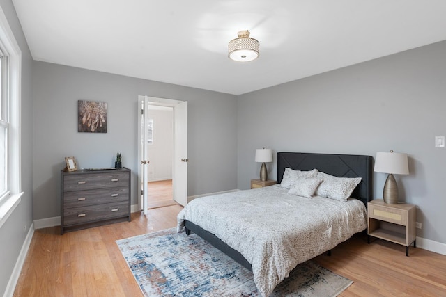 bedroom featuring light wood-type flooring