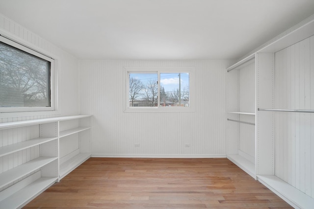 walk in closet featuring light hardwood / wood-style flooring