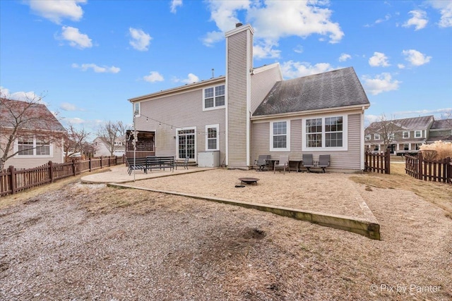 rear view of house with a patio