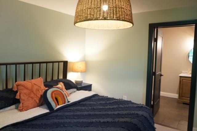 bedroom with tile patterned floors