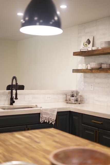 kitchen with decorative backsplash and sink