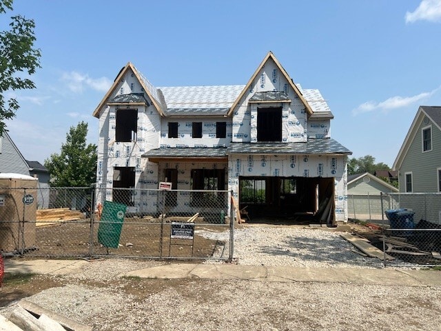 185 E Oneida Ave, Elmhurst, IL 60126 - property under construction featuring a fenced front yard and a garage
