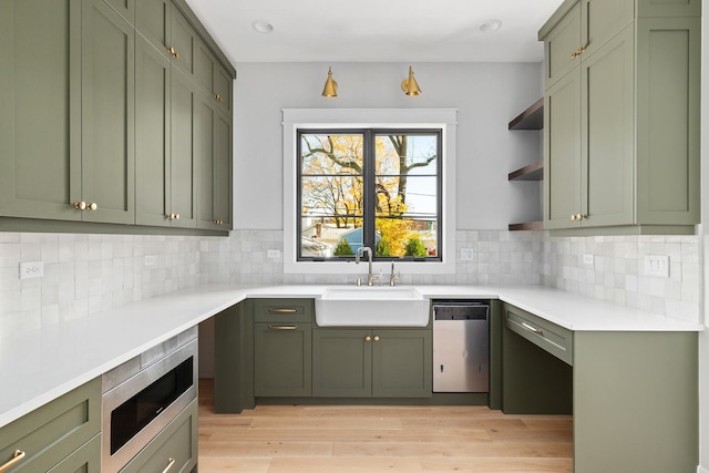 185 E Oneida Ave, Elmhurst, IL 60126 - kitchen featuring green cabinetry, dishwashing machine, a sink, and recessed lighting