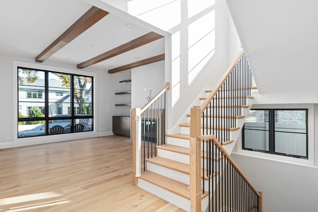 185 E Oneida Ave, Elmhurst, IL 60126 - staircase with beamed ceiling, wood finished floors, and baseboards