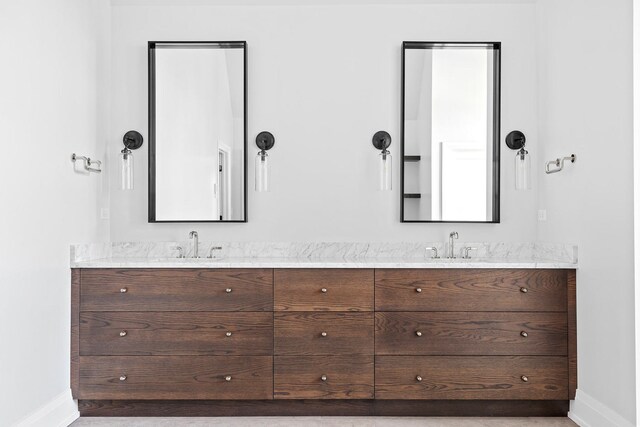 185 E Oneida Ave, Elmhurst, IL 60126 - bathroom featuring baseboards and double vanity