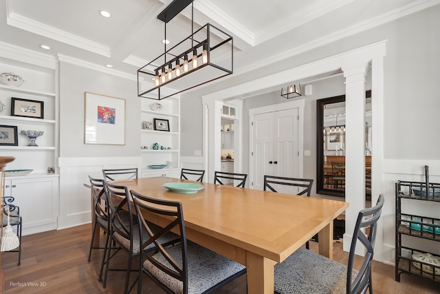 dining room with ornamental molding, dark wood-type flooring, ornate columns, and beam ceiling