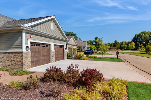 view of home's exterior with a garage