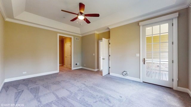 unfurnished bedroom with crown molding, access to exterior, ceiling fan, and light colored carpet