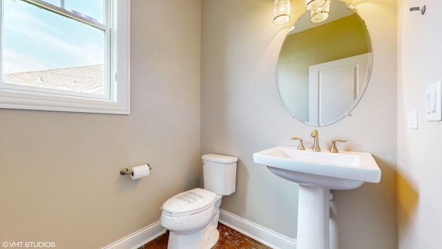 bathroom featuring toilet