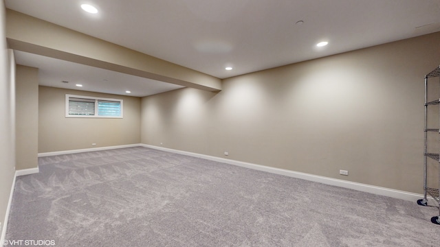 basement with light carpet