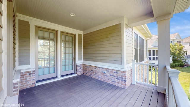 wooden terrace with covered porch