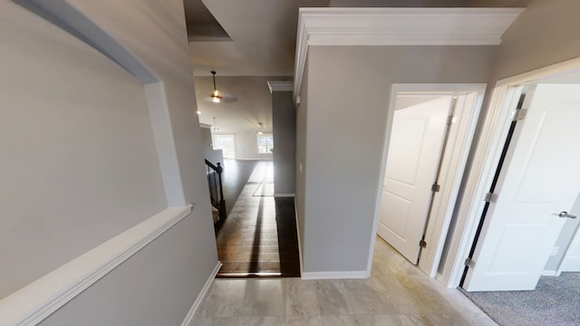 8309 Dylan Dr, Merrillville, IN 46410 - hallway with baseboards and an upstairs landing
