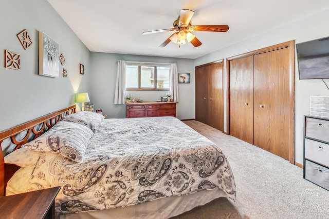 bedroom with ceiling fan and carpet flooring