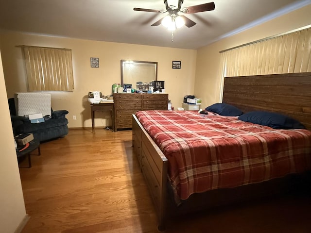 bedroom featuring ceiling fan and light wood-type flooring