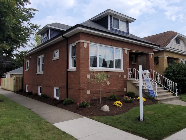 exterior space with a front yard