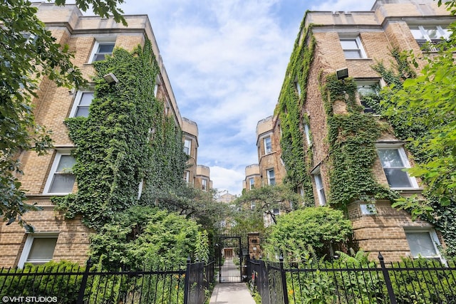 view of property featuring a fenced front yard