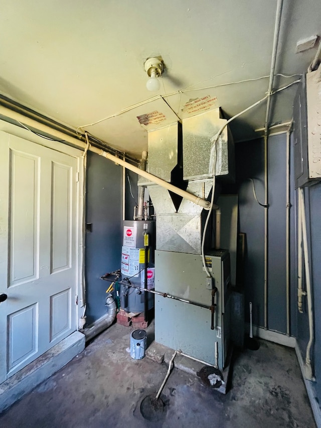 utility room with water heater and heating unit