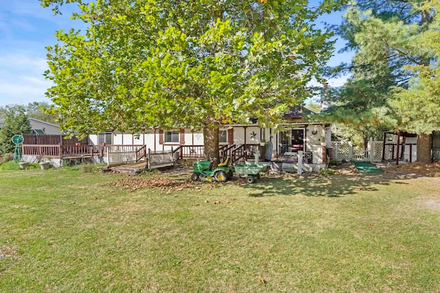 view of yard with a wooden deck