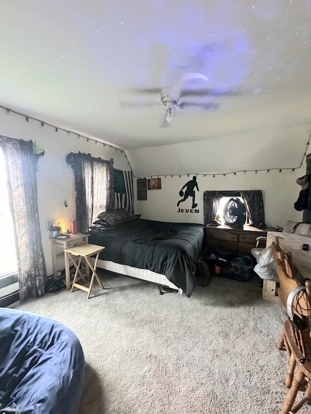 bedroom featuring vaulted ceiling and ceiling fan