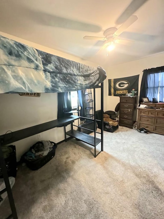 bedroom featuring carpet and a ceiling fan