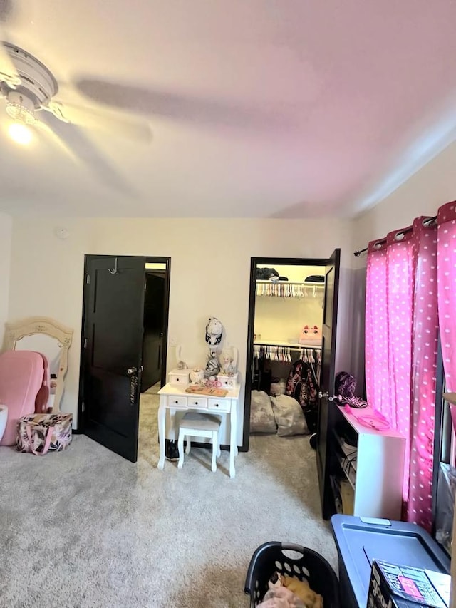 bedroom featuring carpet and a ceiling fan