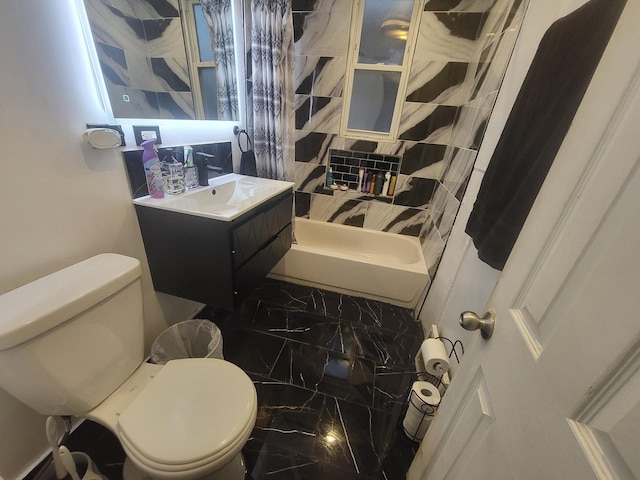 full bathroom with shower / bath combo with shower curtain, vanity, and toilet