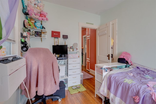 bedroom featuring light wood-type flooring