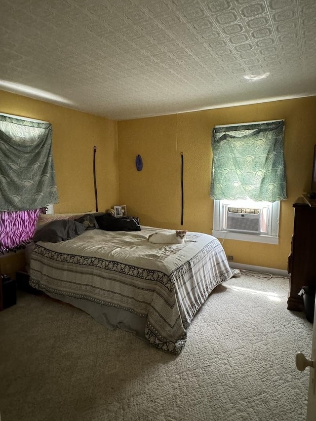 bedroom featuring cooling unit and carpet flooring