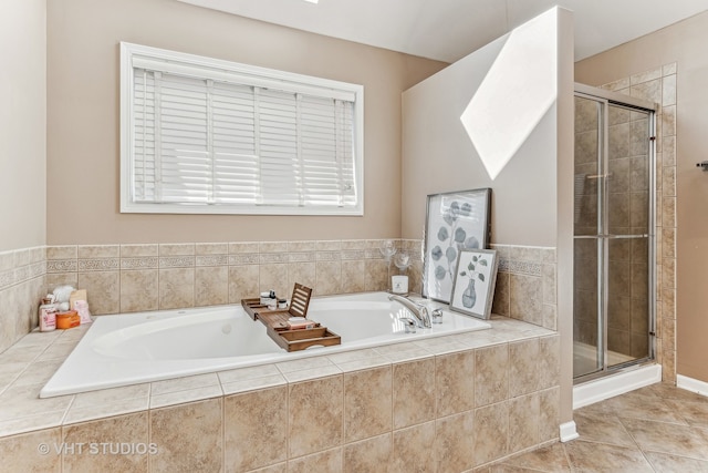 bathroom with plus walk in shower and tile patterned floors