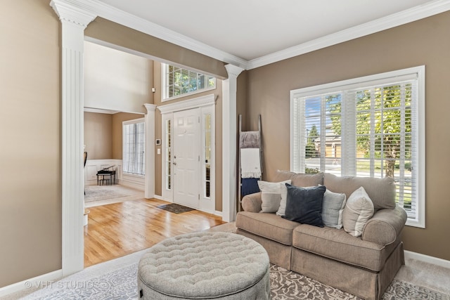 living room featuring light hardwood / wood-style floors and ornamental molding