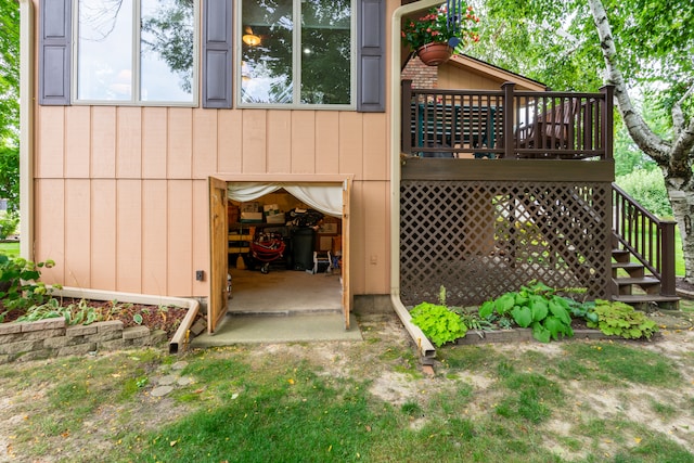 back of property featuring a deck