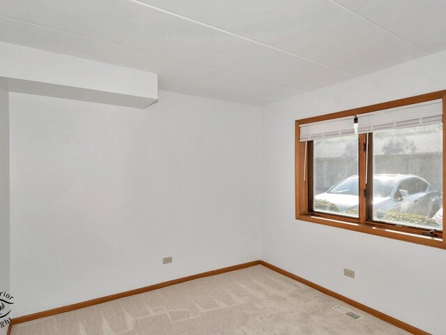 view of carpeted spare room