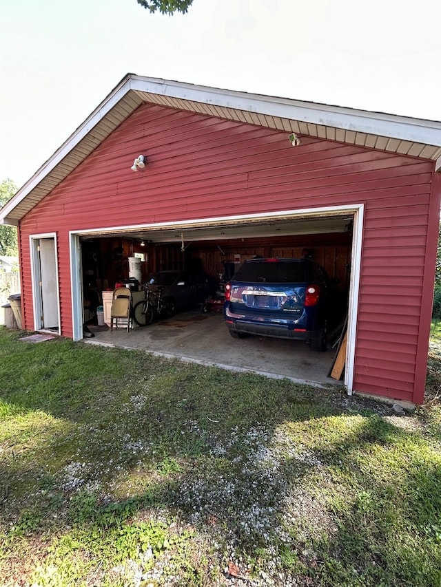 garage with a lawn