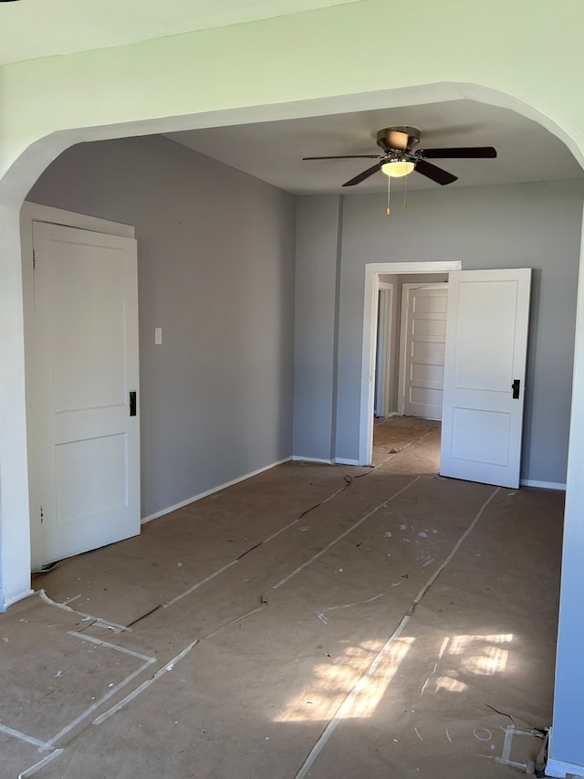 unfurnished room featuring ceiling fan