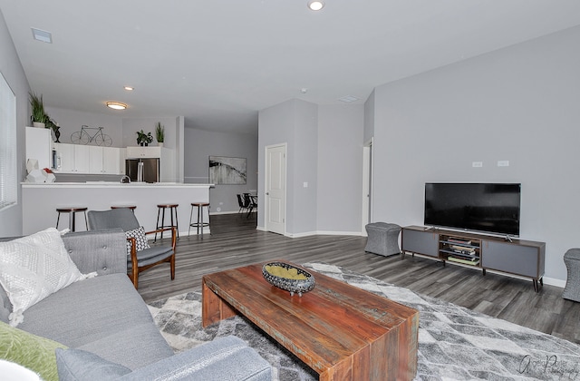 living room with dark wood-type flooring