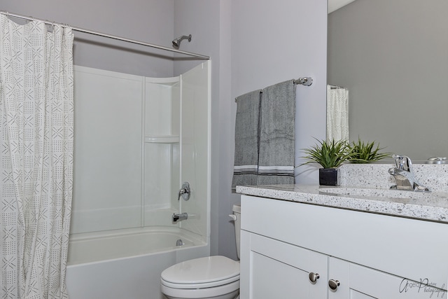 full bathroom featuring vanity, toilet, and shower / tub combo with curtain