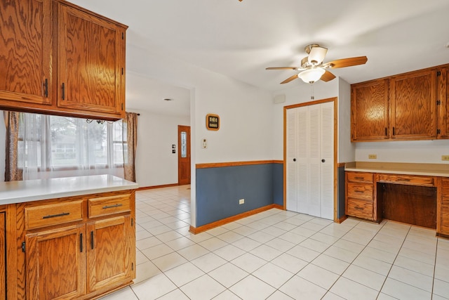 kitchen with light tile patterned flooring and ceiling fan