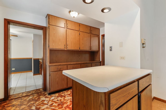 kitchen with light tile patterned floors