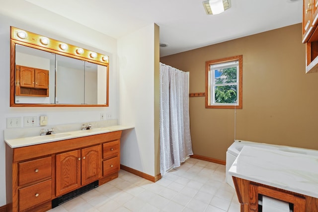 bathroom with a shower with curtain and vanity