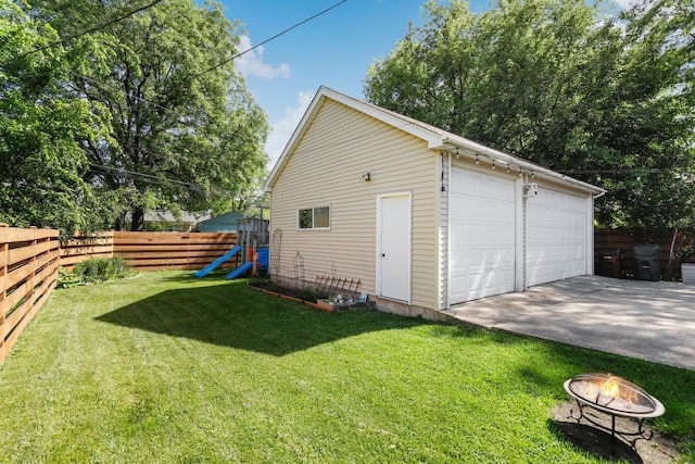 garage featuring a yard