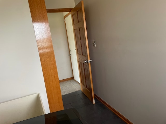 hall featuring tile patterned floors