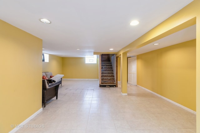 basement featuring light tile patterned floors