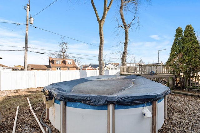 view of yard featuring a swimming pool side deck