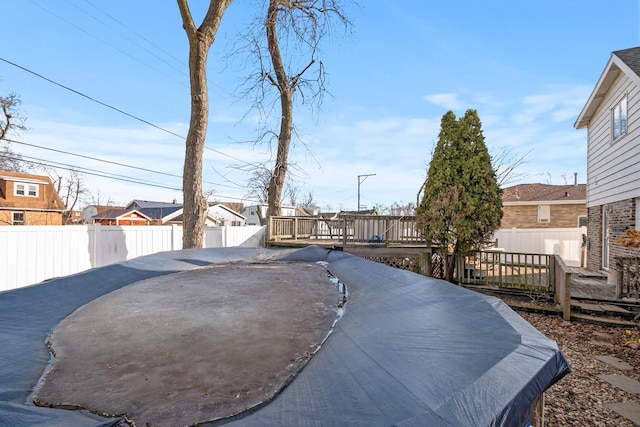 view of yard with a wooden deck