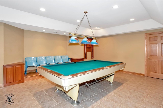 game room with pool table and a tray ceiling